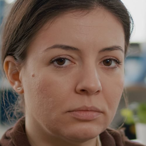 Close up of business woman with disabilities looking sad at camera while diverse team working at financial project. Multiethnic coworkers talking in startup financial company with modern workspace SSUCv3H4sIAAAAAAAACjxRy27bMBD8FYFn0yUlSpR8a4ykRS/NoWgPURGsyJVNhBYFkkoRBP73rpTHbbmcndmZfWUDJGfY4ZU575eUI2QXJnYQOxZxshi38jlWjdgqtC6H6MBvrwGyOU9wQXaYFu+vO5Yy5CVhIkZ6Gch4Ivj2/pB6eF377MBuluQmTOnLnZtgMshofBno4x7D7JFddx/IX0gywYfTyyfmGC7zkjEmdv27Y3DCybysoqQa0SNsOzwwK8fGKFnzupYlV7YcOCjsuLBajVIOY2MFcaq21oii5GNXW65qM/BuhIFrpeWgtbCiMwTrlAEt0fCh6iqu5Gg56EbyVpZKKmikxorROk//aLPLewiwWBdW/8/BgKdmRc05OuOm0xsi5PMaNLkNy5Qj+WAk5kOYYaAcDiON4Y6dISUC2PfGmi9dLFzeSKaQV8vrpKXYqZJVqStZqbISoqpFI9Sa3nags6PBVWidpNI8Ofu+riN+1owAGmzDaxgUV6VVvNXlyLUhStN2LdkmsmX2AWxe3dHkGOJlO1eERP43C+R4hnym5u2h7+W++BPiExkv7s8hh9T3Wlb74u62uPELFj/H0RksePEdJusMzDPa4hjonKcF+77cF78xZvrwff9VdPpRlKUWXd0+HkUr9kK0jaxFtf9x/41d/wMAAP//AwB50JKQ3AIAAA==